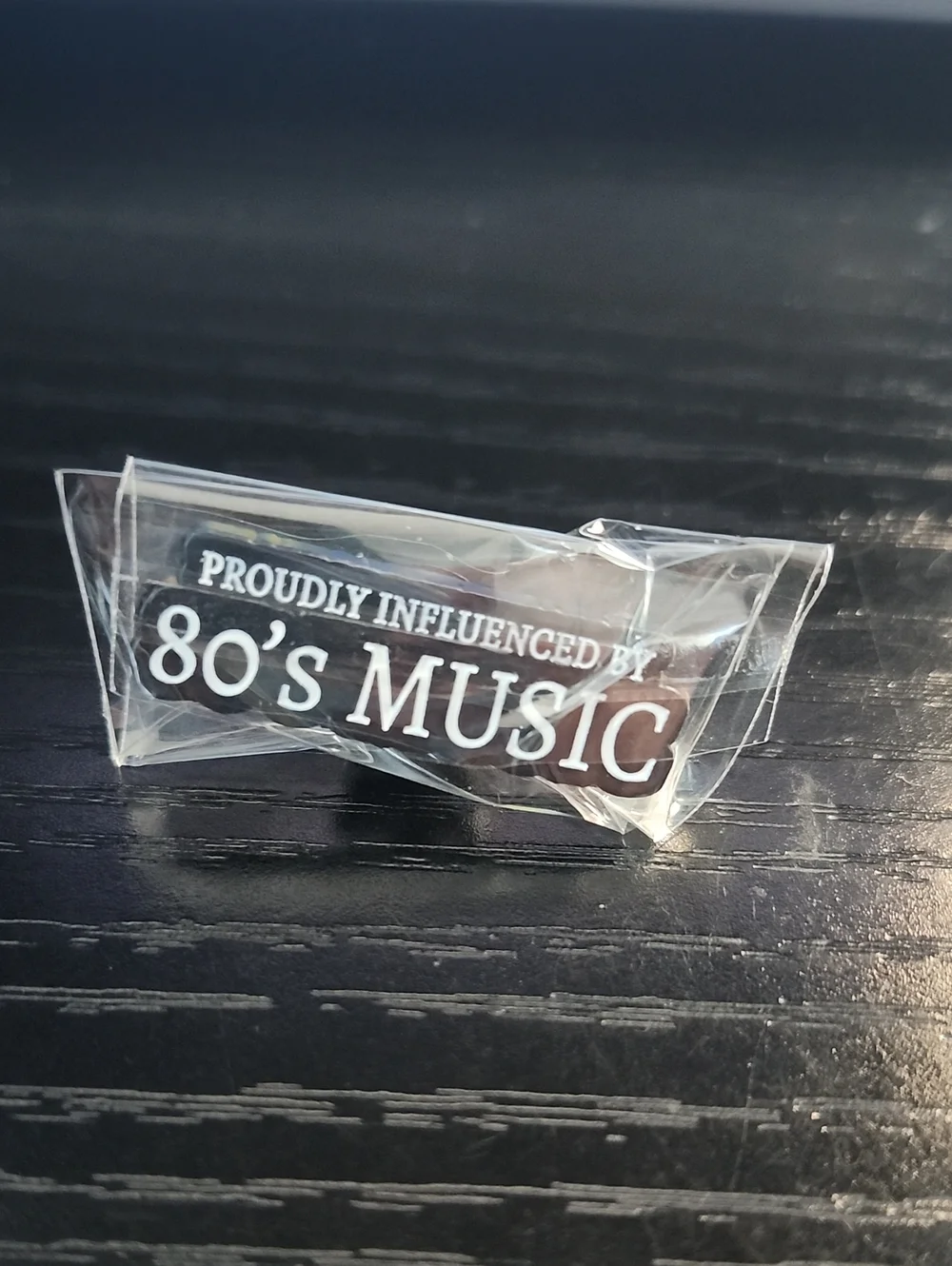 Proudly Influenced By 80's Music Enamel Pin - Black & White